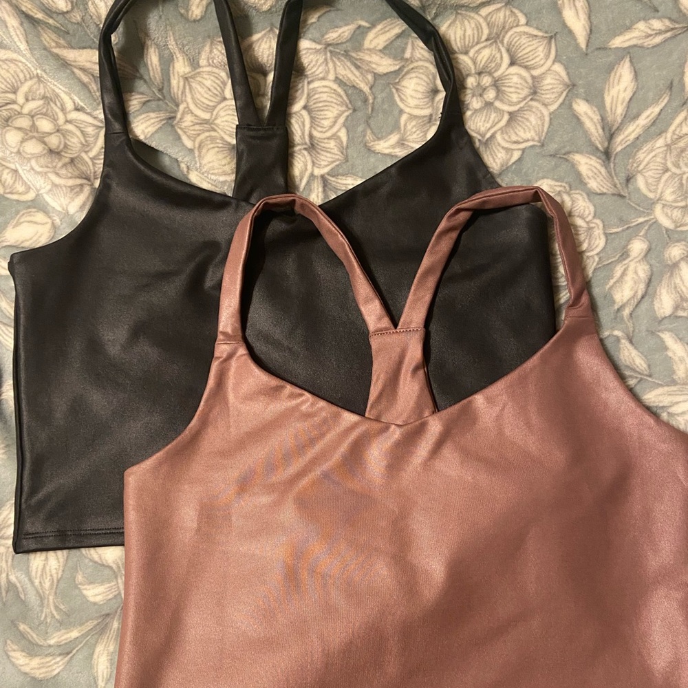 Slightly cropped workout tanks.